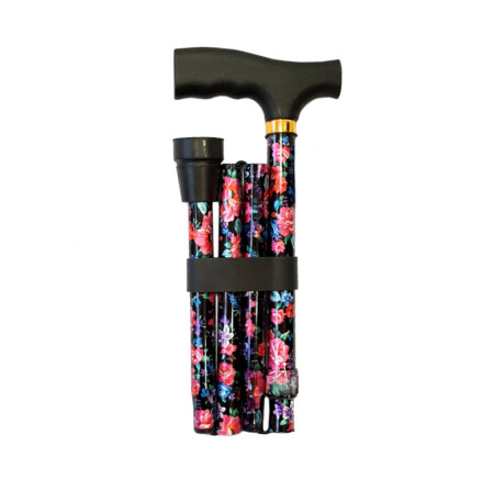 Hopf�llbar k�pp, svart med r�da blommor och gr�na blad